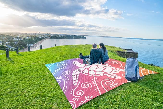 WEKAPO Beach Blanket Waterproof Sandproof Oversized Extra Large Sand Free Beach Mat with Stakes, Storage Bag - Essentials for Outdoor Beach, Picnic (Pinkish Purple Sea Turtle, 8 X 7 FT (1~4 Person))