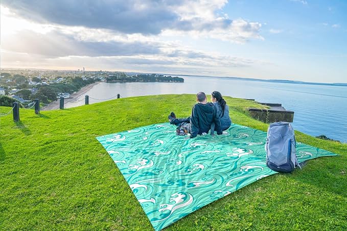 WEKAPO Beach Blanket Waterproof Sandproof Oversized Extra Large Sand Free Beach Mat with Stakes, Storage Bag - Essentials for Outdoor Beach, Picnic (Turquoise Ocean Waves, 11 X 9 FT (1~10 Person))