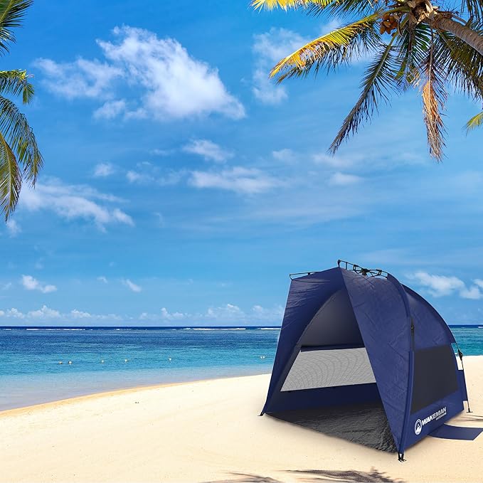 Pop Up Beach Tent Sun Shelter for Shade with UV Protection, Water and Wind Resistant, Instant Set Up and Carry Bag by Wakeman Outdoors, Navy, 55" x 87" (153133NYX)