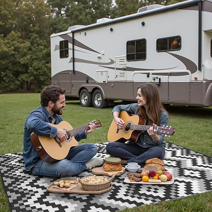 GENIMO Outdoor Rug for Patio, 6' x 9' Lightweight Waterproof Plastic Straw Rugs, Reversible Camping Carpet, Large Area Rugs Mat for RV, Deck, Balcony, Porch, Backyard, Black & White