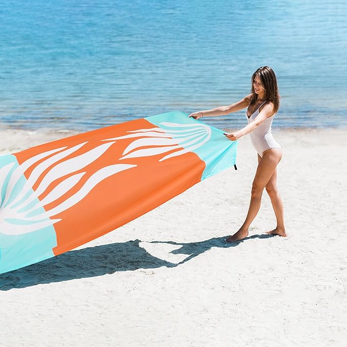 Beach Blanket Waterproof Sandproof Oversized, 9 Ft X 10 Ft Extra Large Sand Free Beach Mat with 4 Stakes, Compact Outdoor Essentials with Storage Bag for Beach, Picnic, Camping, Travel