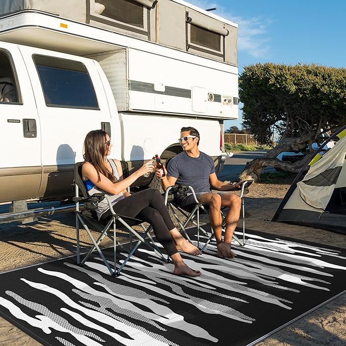GENIMO Outdoor Rug for Patio Clearance, 6'x9' Waterproof Camping Mat, Reversible Plastic Straw Rugs for RV, Camper, Balcony, Backyard, Picnic, Deck (Black&White)